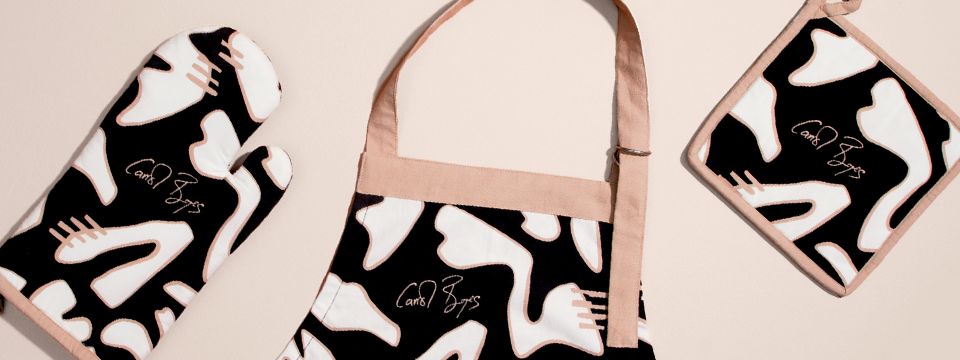 Kitchen softs banner with kitchen textiles like towels and mitts