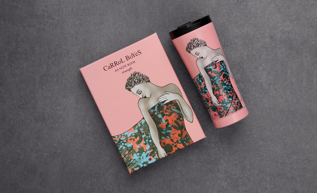 Collection of black bottles and containers with white artistic designs, including hand wash, lotion, hand sanitizer, and a candle, set against a neutral background.