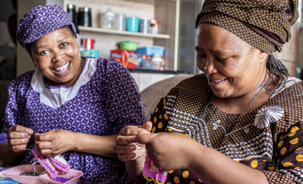 MonkeyBiz banner showcasing beaded art pieces